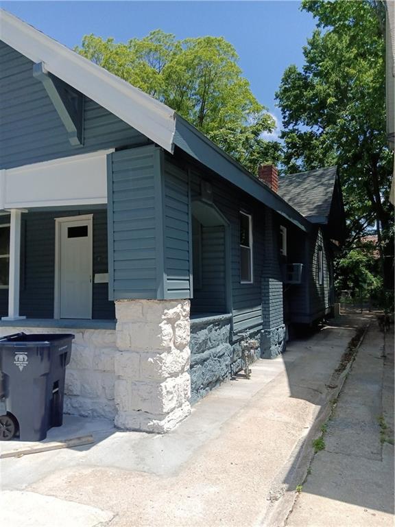 3731 College Ave, Kansas City, MO 64128 - view of property exterior featuring a porch