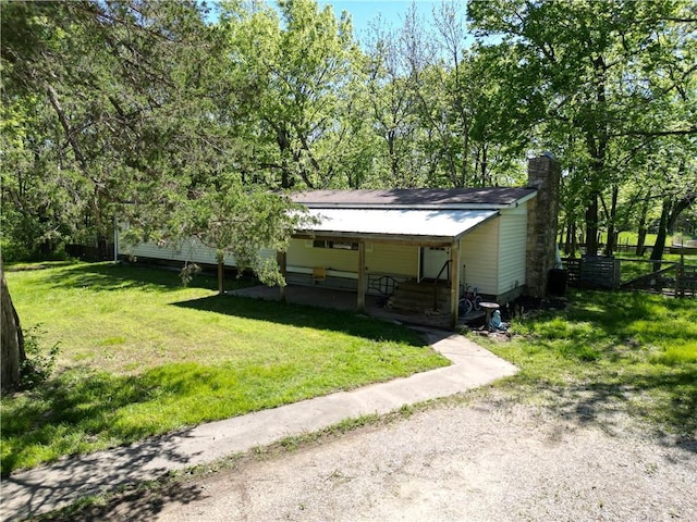 exterior space featuring a lawn