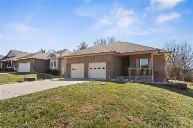 single story home featuring a front lawn, brick siding, concrete driveway, and an attached garage