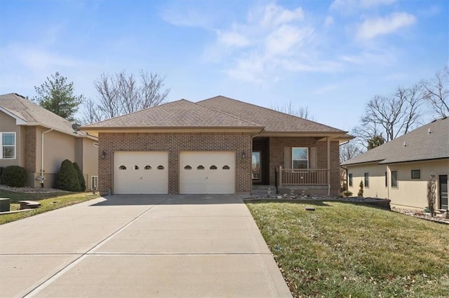 view of front facade with brick siding, a front lawn, concrete driveway, roof with shingles, and an attached garage