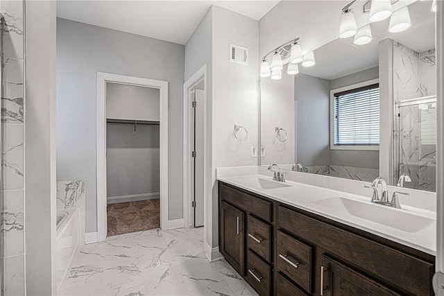 bathroom featuring vanity and plus walk in shower