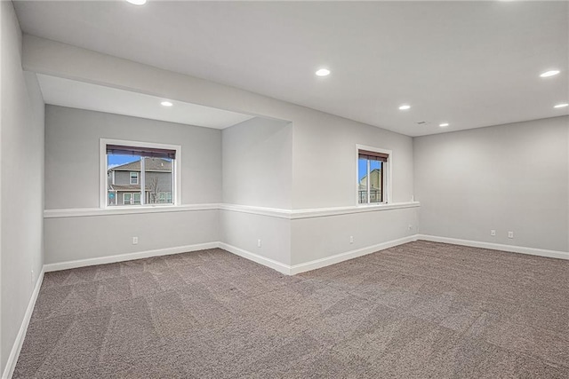 empty room featuring carpet and a healthy amount of sunlight