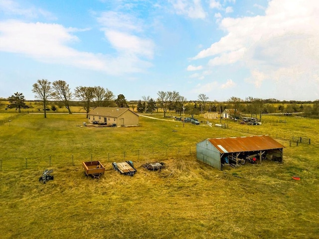 exterior space featuring an outbuilding and a rural view