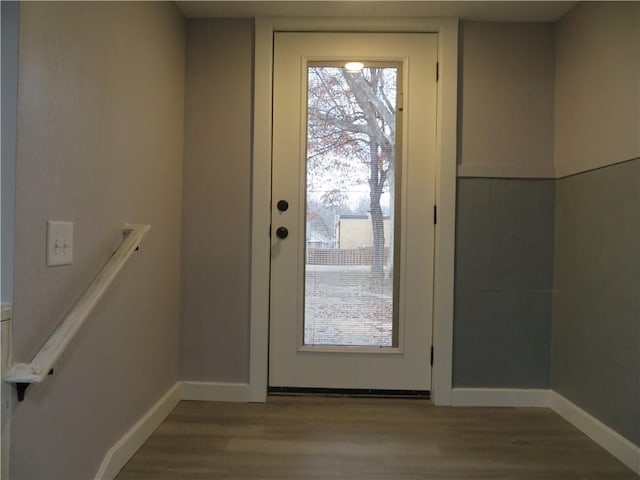 doorway featuring hardwood / wood-style flooring