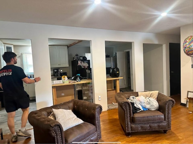 living area featuring wood finished floors