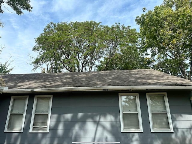 details featuring a shingled roof
