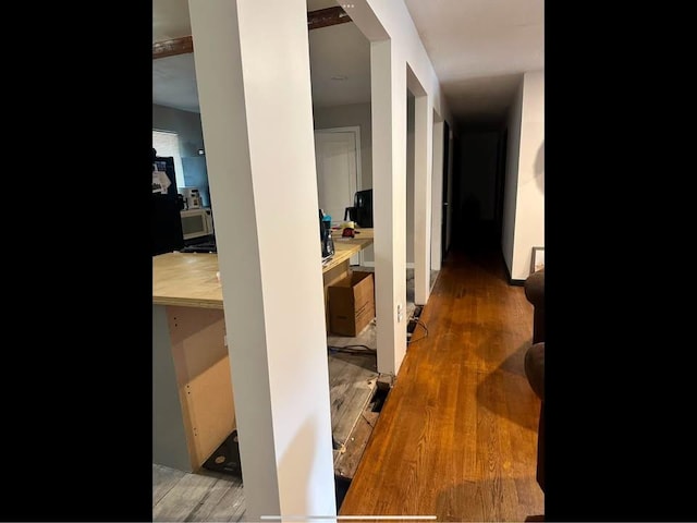 hallway featuring wood finished floors