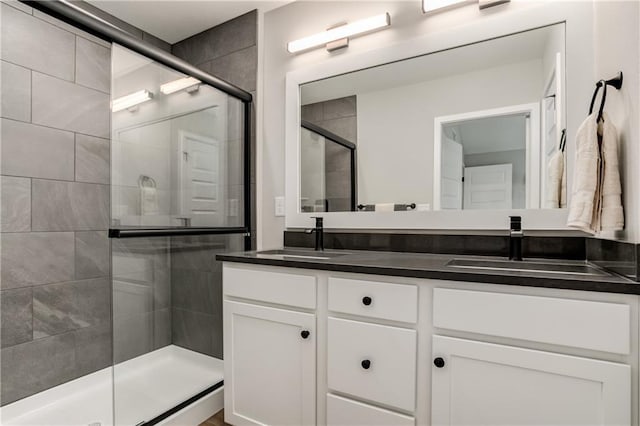 bathroom featuring vanity and walk in shower