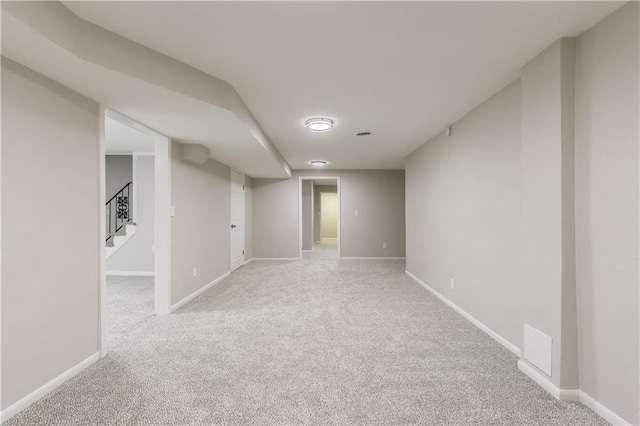 basement with light carpet