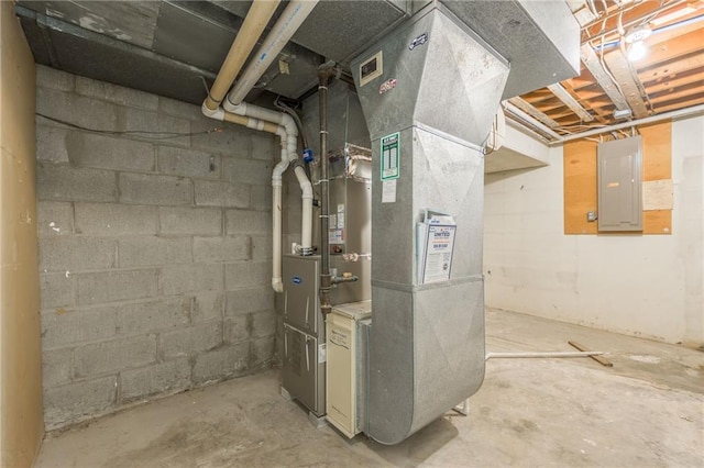 utility room featuring heating unit and electric panel