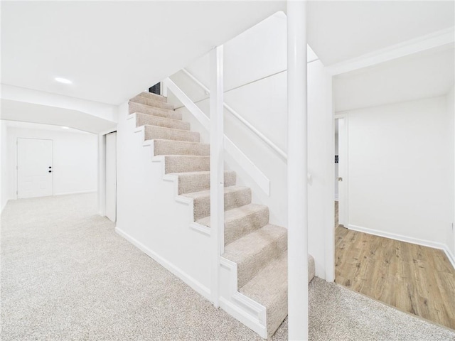 3201 S Norton Ave, Independence, MO 64052 - staircase featuring baseboards and carpet
