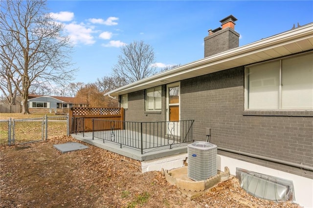 3201 S Norton Ave, Independence, MO 64052 - exterior space featuring fence, cooling unit, and a gate