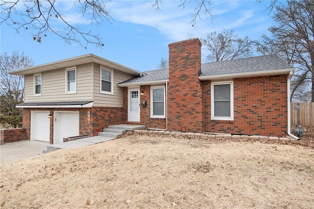 split level home with a garage