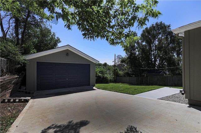 garage with a lawn