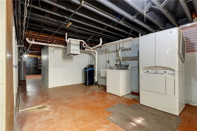 basement with sink, gas water heater, and independent washer and dryer