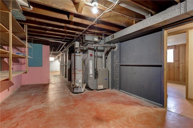 basement with heating unit and gas water heater