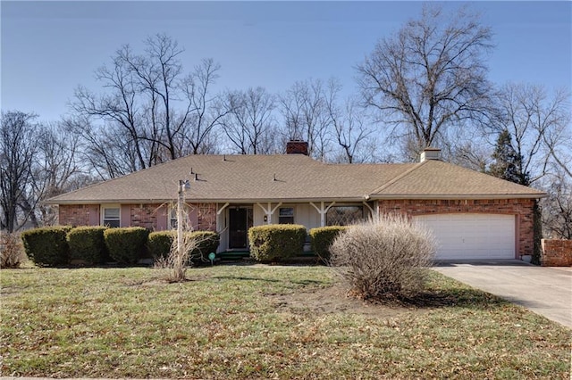 single story home featuring a garage and a front lawn