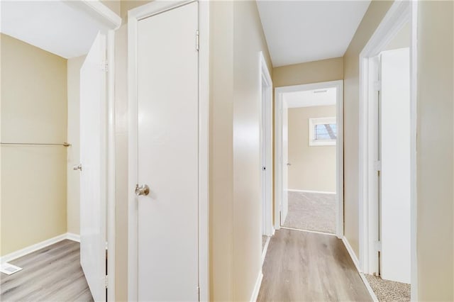 hallway featuring light wood-type flooring