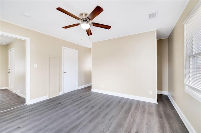 empty room featuring ceiling fan and light wood-type flooring