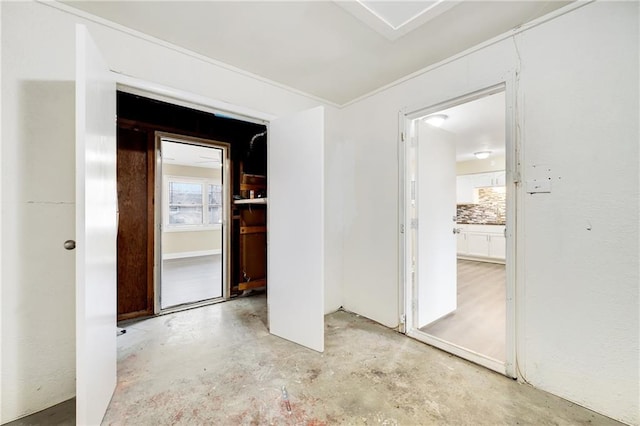 interior space with crown molding