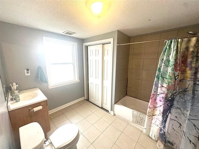 full bathroom featuring visible vents, shower / bath combo with shower curtain, vanity, a textured ceiling, and tile patterned flooring