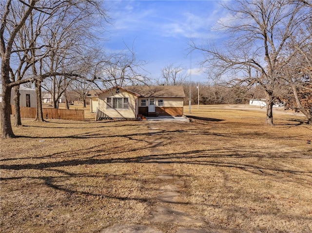 exterior space featuring a front yard