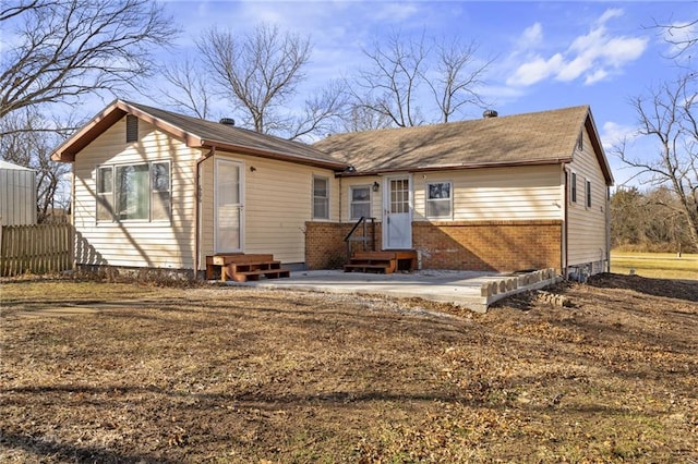 back of property featuring a patio