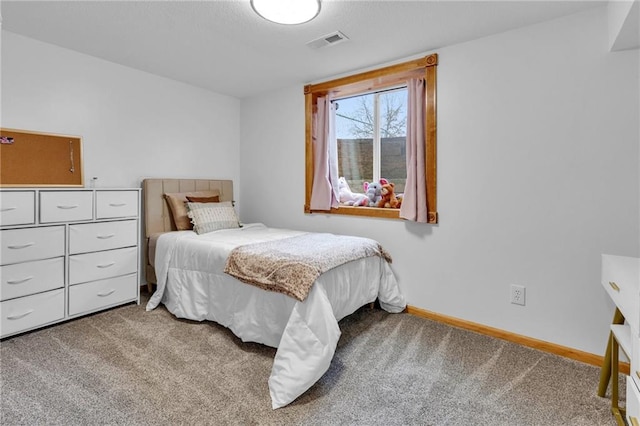 bedroom featuring carpet