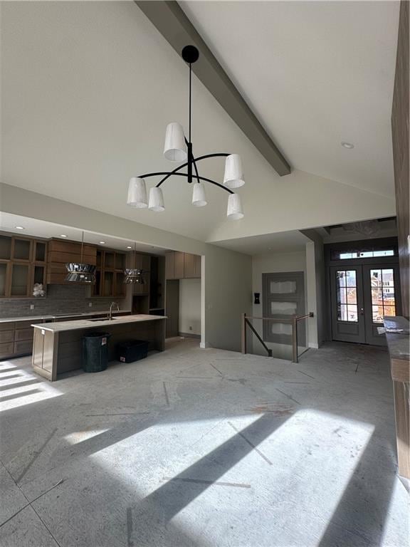 garage featuring french doors and sink