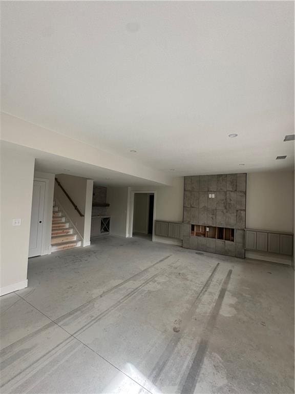 unfurnished living room with a fireplace