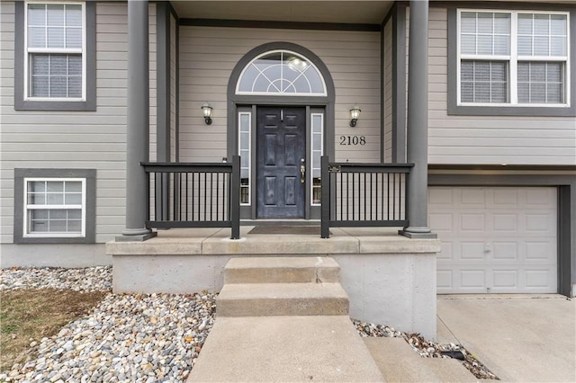 entrance to property featuring a garage