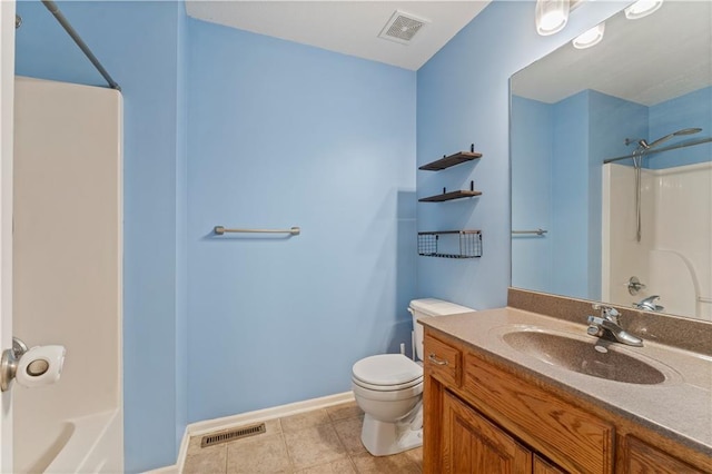 full bathroom with vanity, bathtub / shower combination, tile patterned floors, and toilet