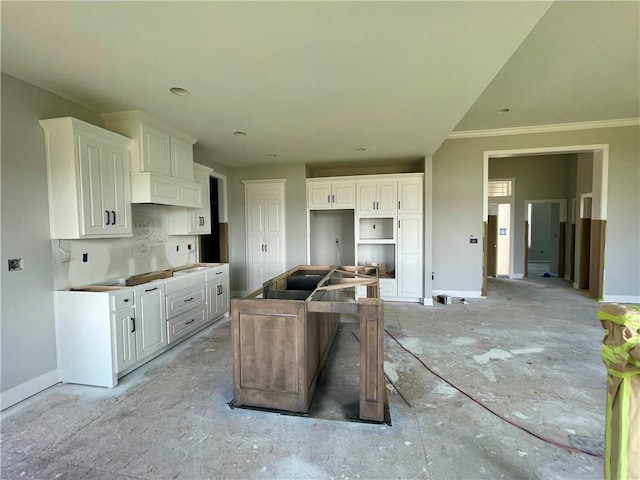 16577 W 165th Pl, Olathe, KS 66062 - kitchen featuring a kitchen island, white cabinets, and crown molding
