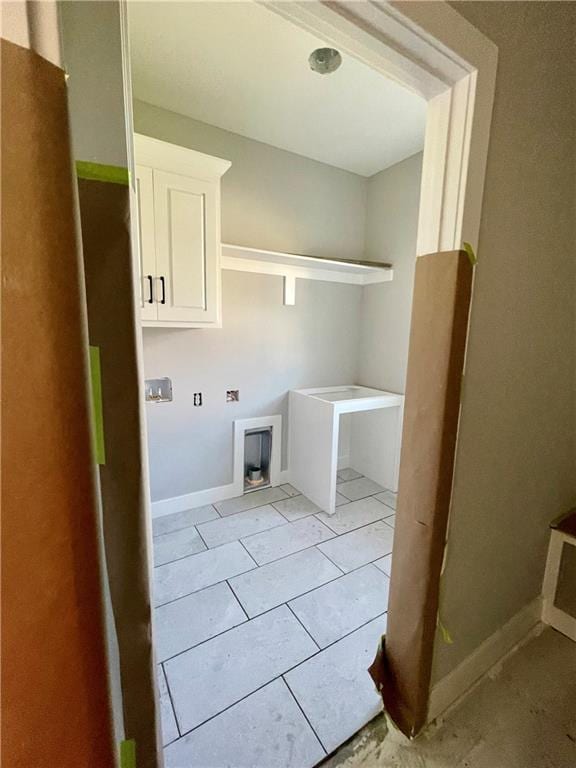 16577 W 165th Pl, Olathe, KS 66062 - laundry area with hookup for a washing machine and light tile patterned floors