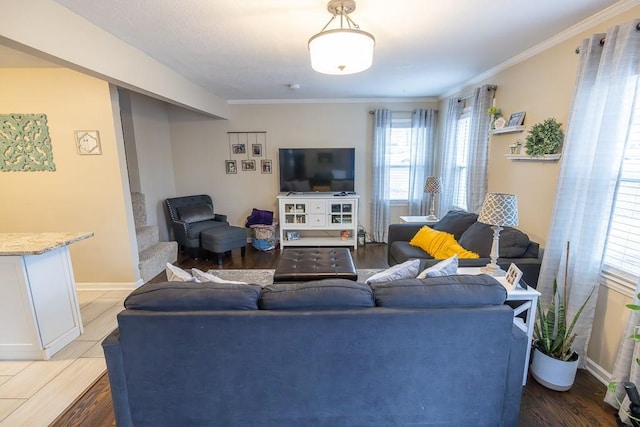 living room with hardwood / wood-style flooring and ornamental molding