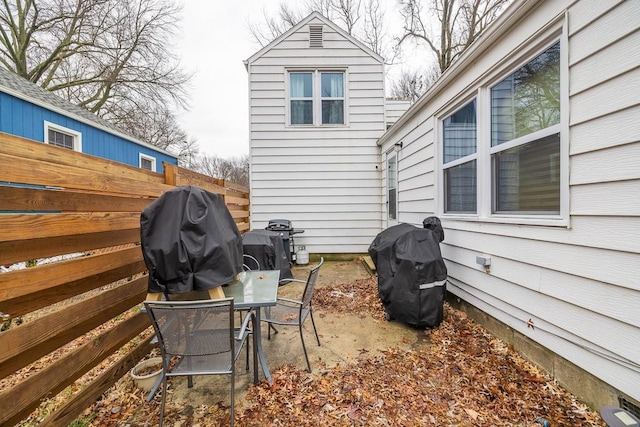 view of patio featuring a grill