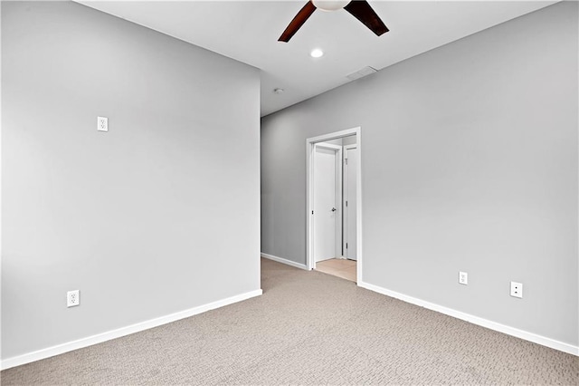 empty room featuring visible vents, baseboards, a ceiling fan, light colored carpet, and recessed lighting