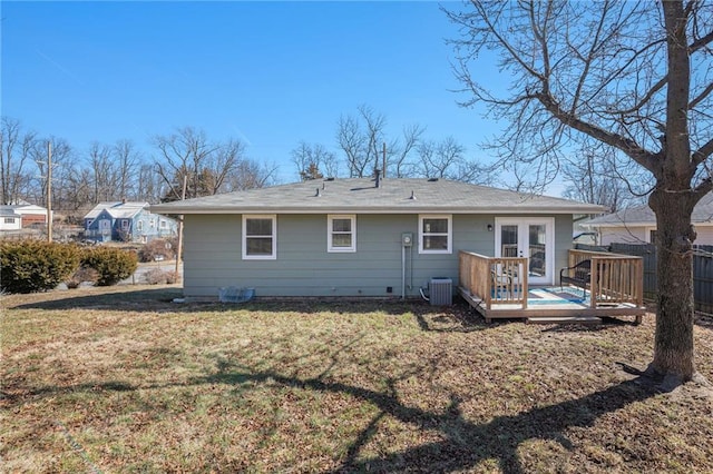 back of house with a wooden deck, central AC unit, a lawn, fence, and french doors