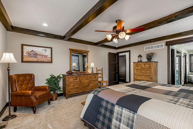 carpeted bedroom featuring ceiling fan and beam ceiling