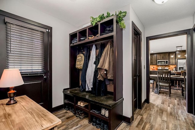 mudroom with light wood-type flooring