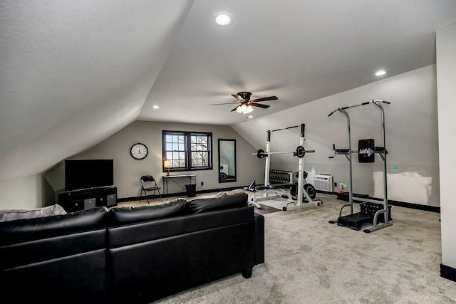 living room featuring ceiling fan, lofted ceiling, and light carpet