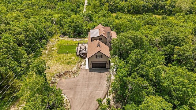2909 S 74th St, Kansas City, KS 66106 - aerial view of property and surrounding area with a forest