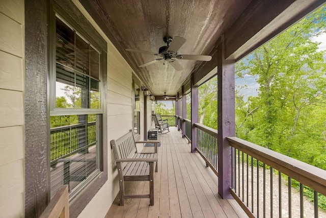 2909 S 74th St, Kansas City, KS 66106 - deck featuring a ceiling fan