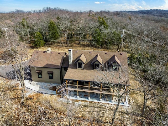 2909 S 74th St, Kansas City, KS 66106 - view of subject property with a heavily wooded area