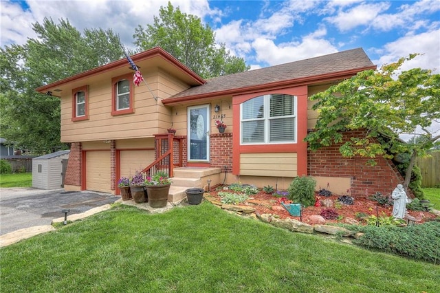 21465 W 180th St, Olathe, KS 66062 - tri-level home with driveway, a garage, a front yard, and brick siding