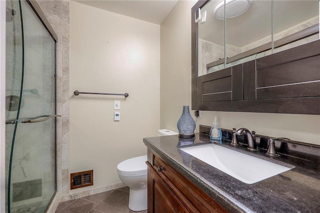 21465 W 180th St, Olathe, KS 66062 - bathroom featuring vanity, a stall shower, and tile patterned flooring