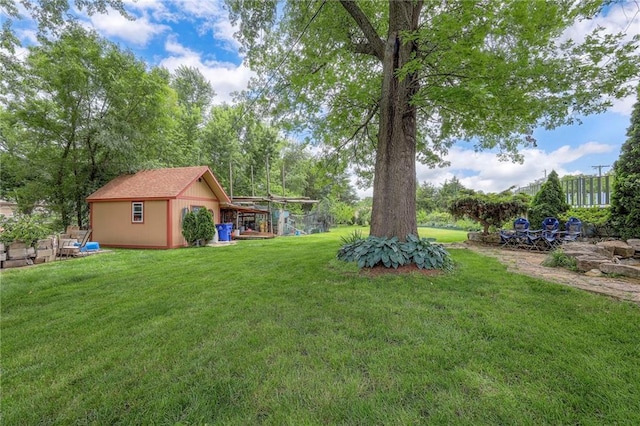 21465 W 180th St, Olathe, KS 66062 - view of grassy yard with an outdoor structure