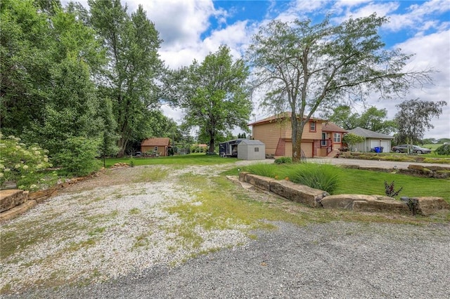 21465 W 180th St, Olathe, KS 66062 - view of yard with driveway