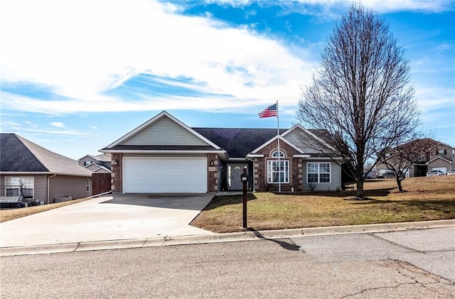 single story home with a garage and a front lawn