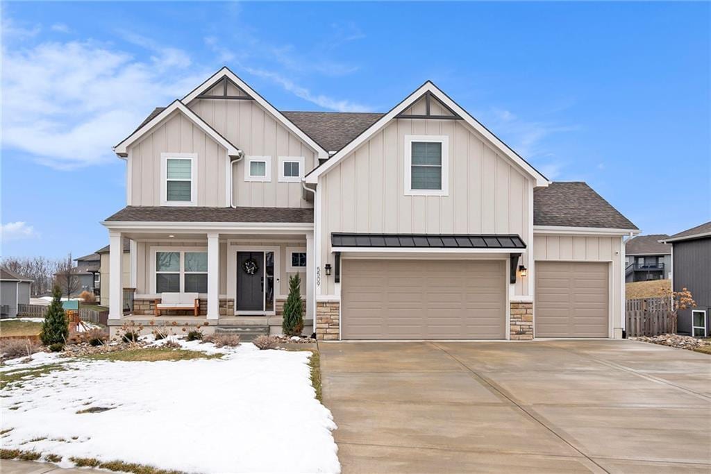 view of front of house with a garage and covered porch